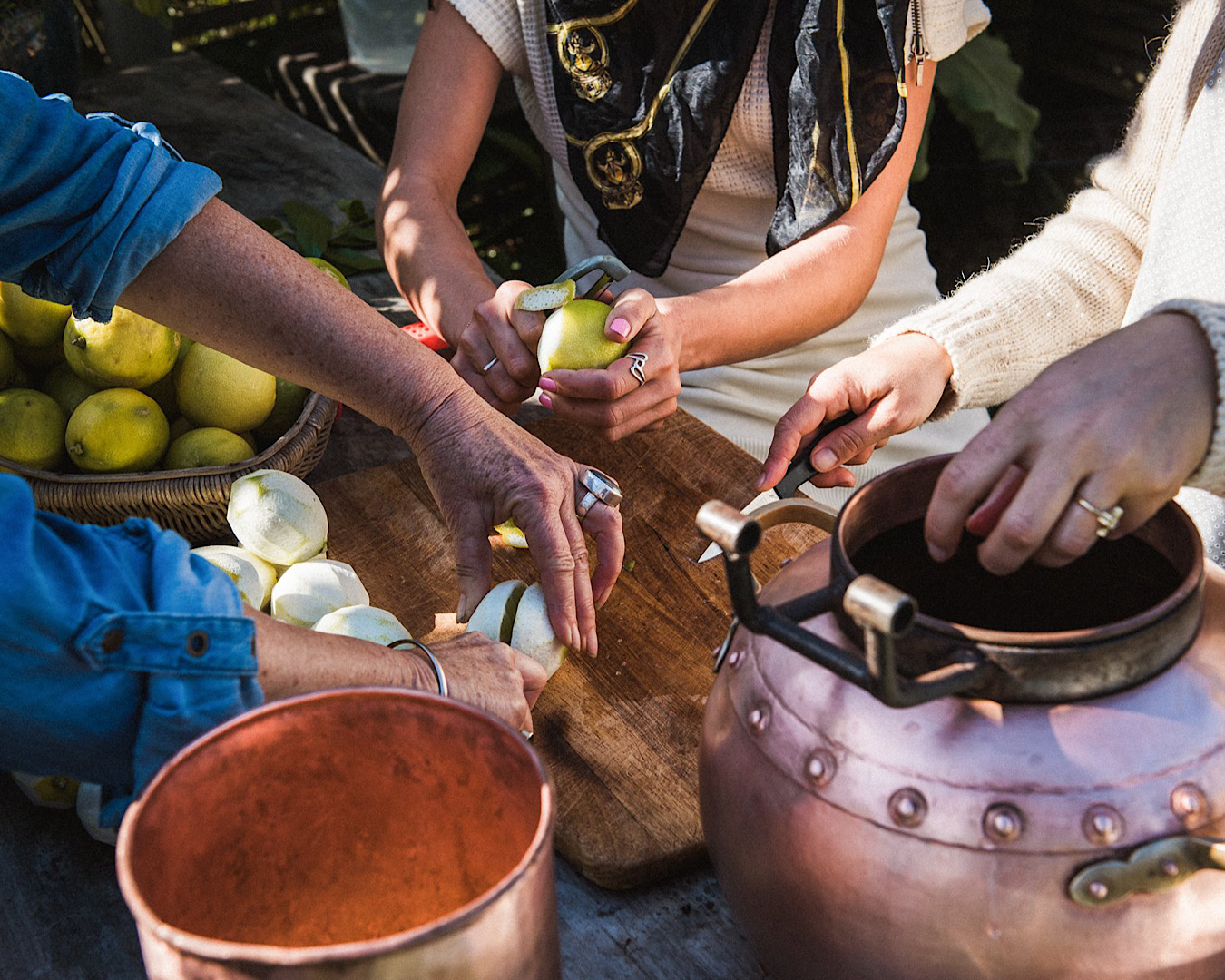 A bunch of hands pitching in at a distillery workshop run by Alembics. 