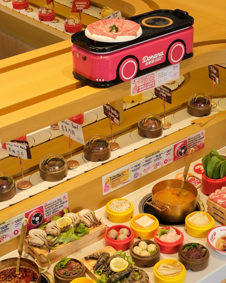 The colourful conveyer belt at Donana Mini Hotpot in Westfield Chermside.