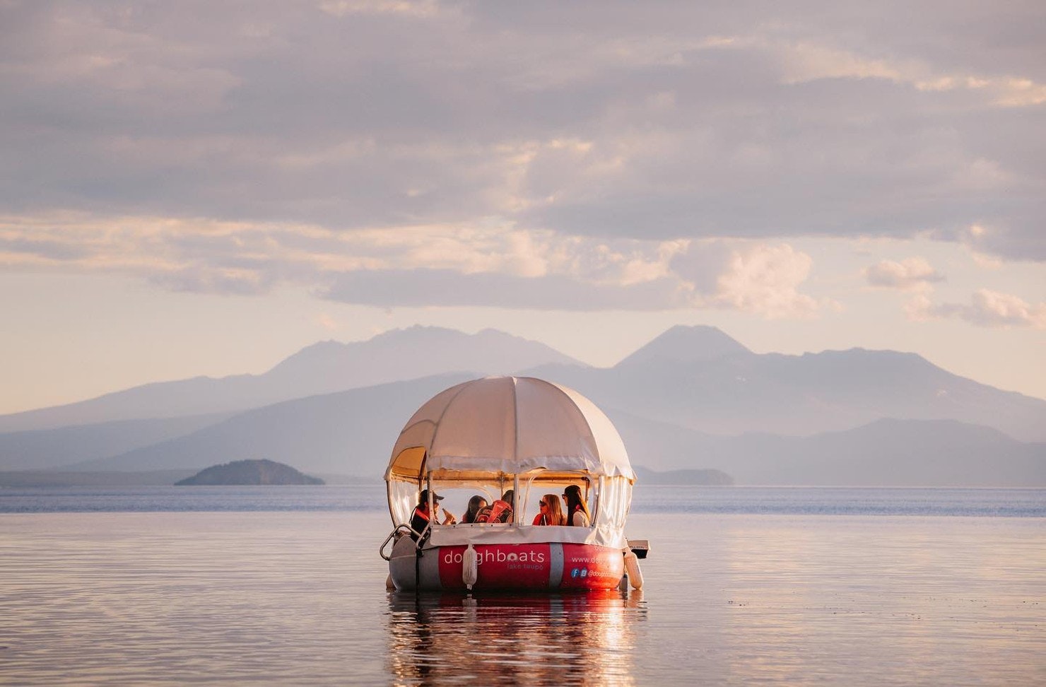 Doughboat floating in a lake in New Zealand