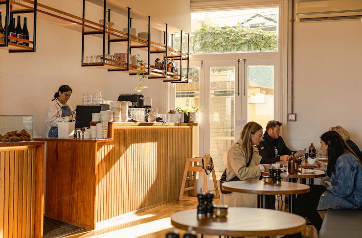 The light and bright dining room at Dulcie Eatery, one of the best cafes in Devonport.