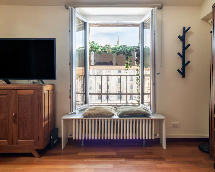 A view of the Duomo from the window at Duomo View Condo best Milan Airbnbs