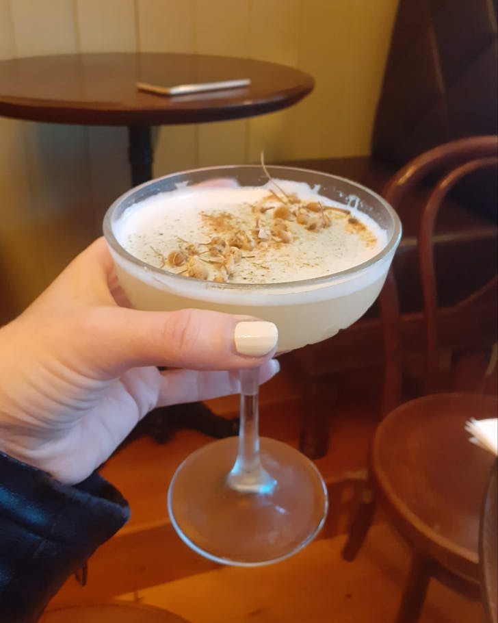A beautiful cream-coloured cocktail from EST. 1901, one of the best bars in Auckland. 