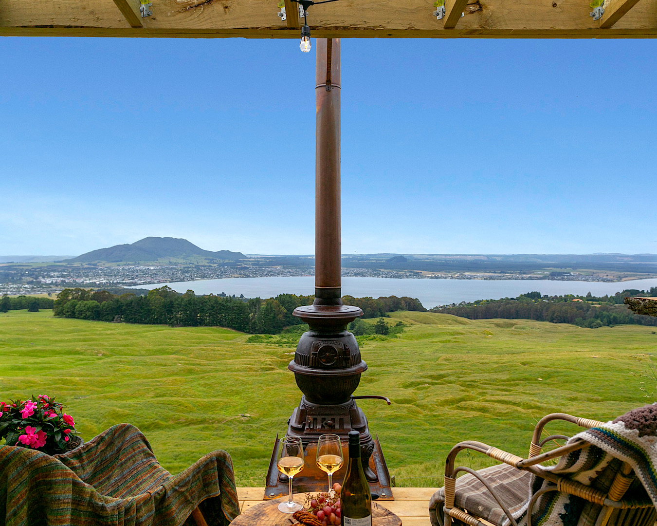 A stunning view over Lake Taupō at Edge Hill Hut, one of the best Airbnbs in Taupō.