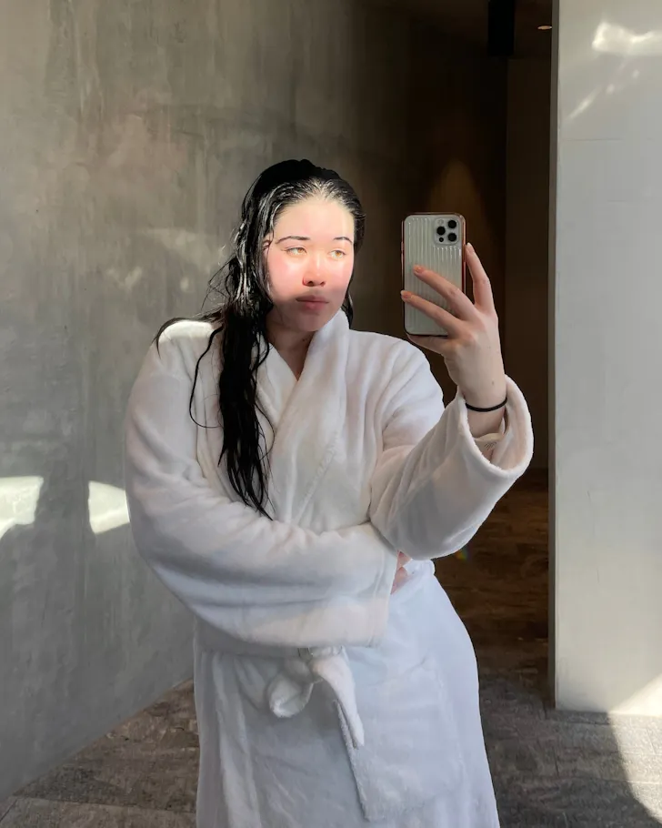 A Woman Taking Pic After Skin Care