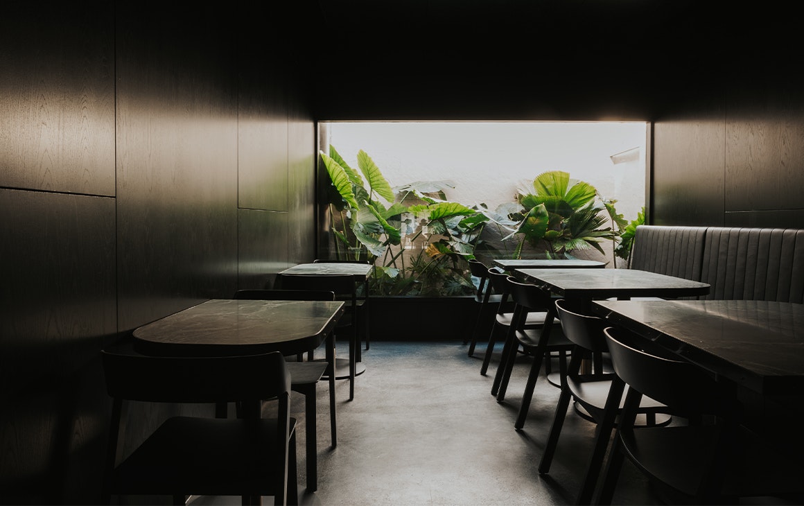 dining area with a window overlooking a garden