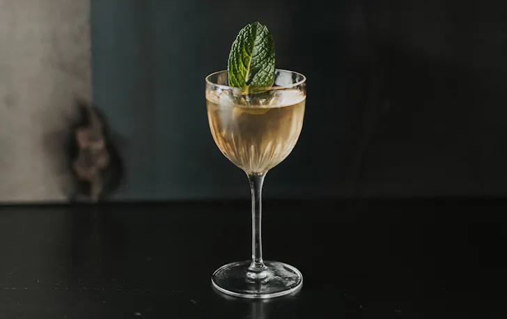 a cocktail in a stemmed glass