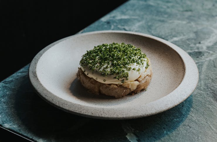 a potato dish with chevre on top