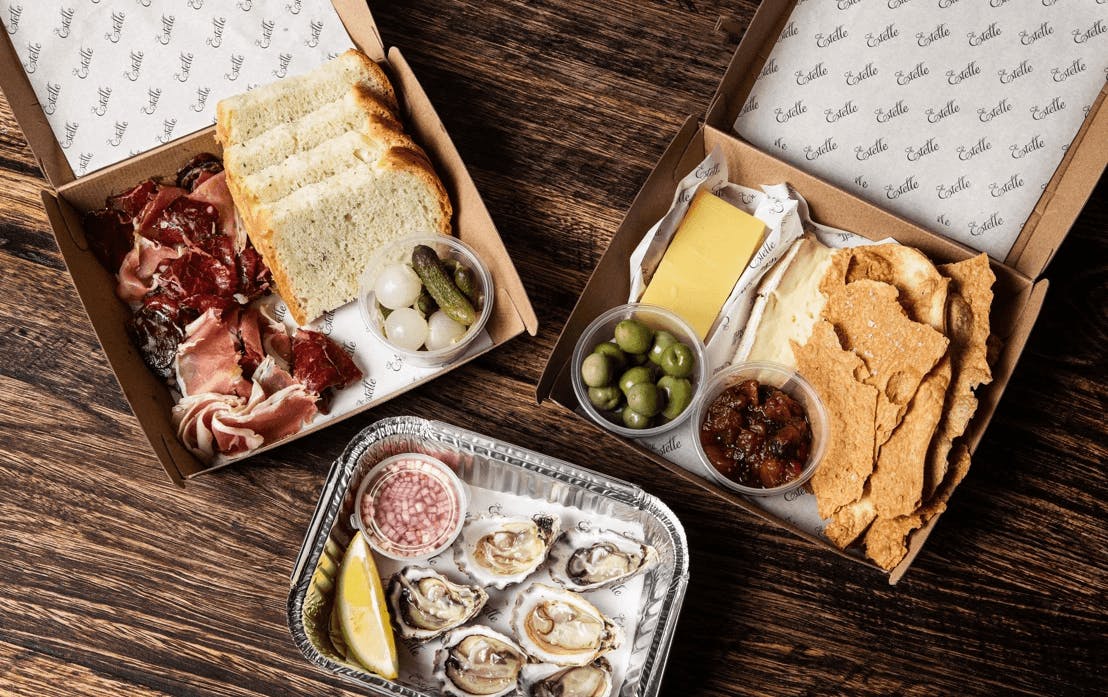 A range of boxes full of different food. 