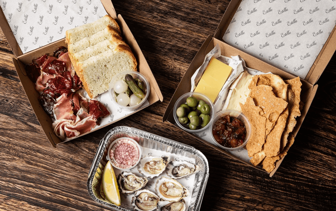 A range of boxes full of different food. 