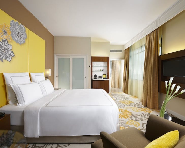 Layout of hotel room with bed