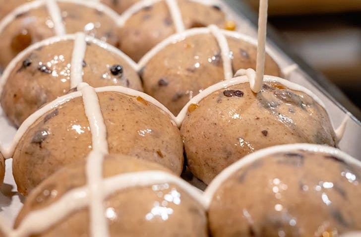A tray of glistening buns at Falcoâone of the best spots for hot cross buns in Melbourne 