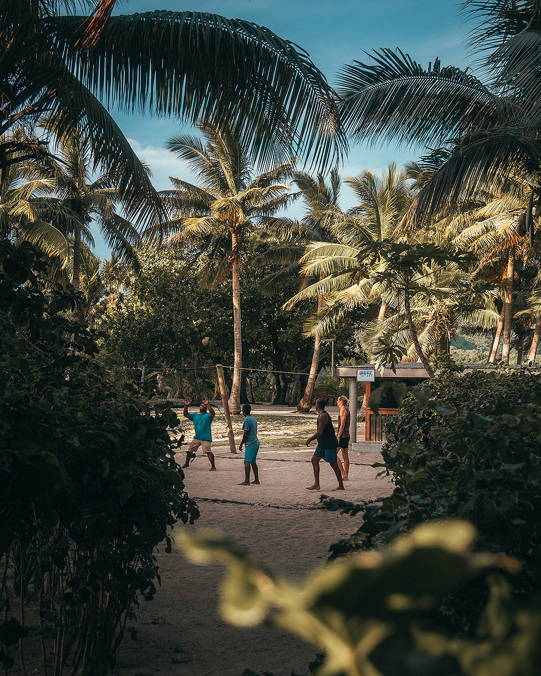 People playing ball on the island paradise of Fiji.