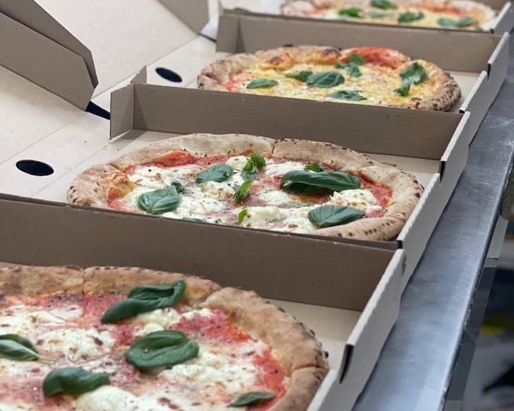 Pizzas upon pizzas at Fire And Slice.