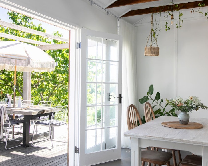 The dining room and outdoor space at Firefly Creek Farm Dairy Stay best NSW farm stays