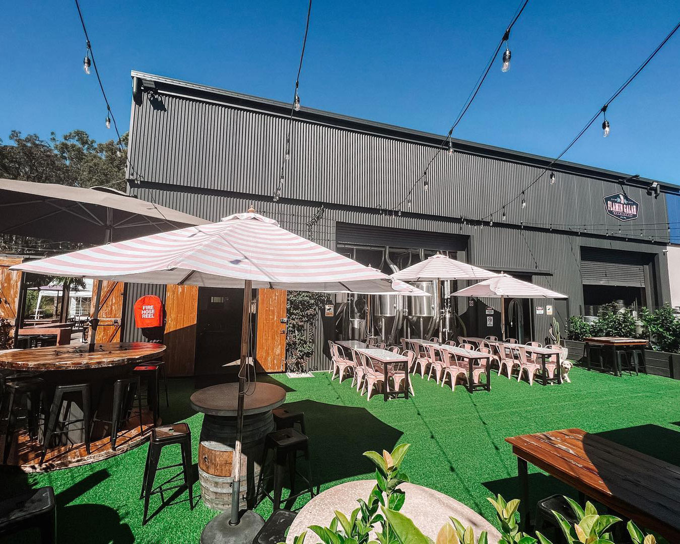 Outdoor area with pink umbrellas