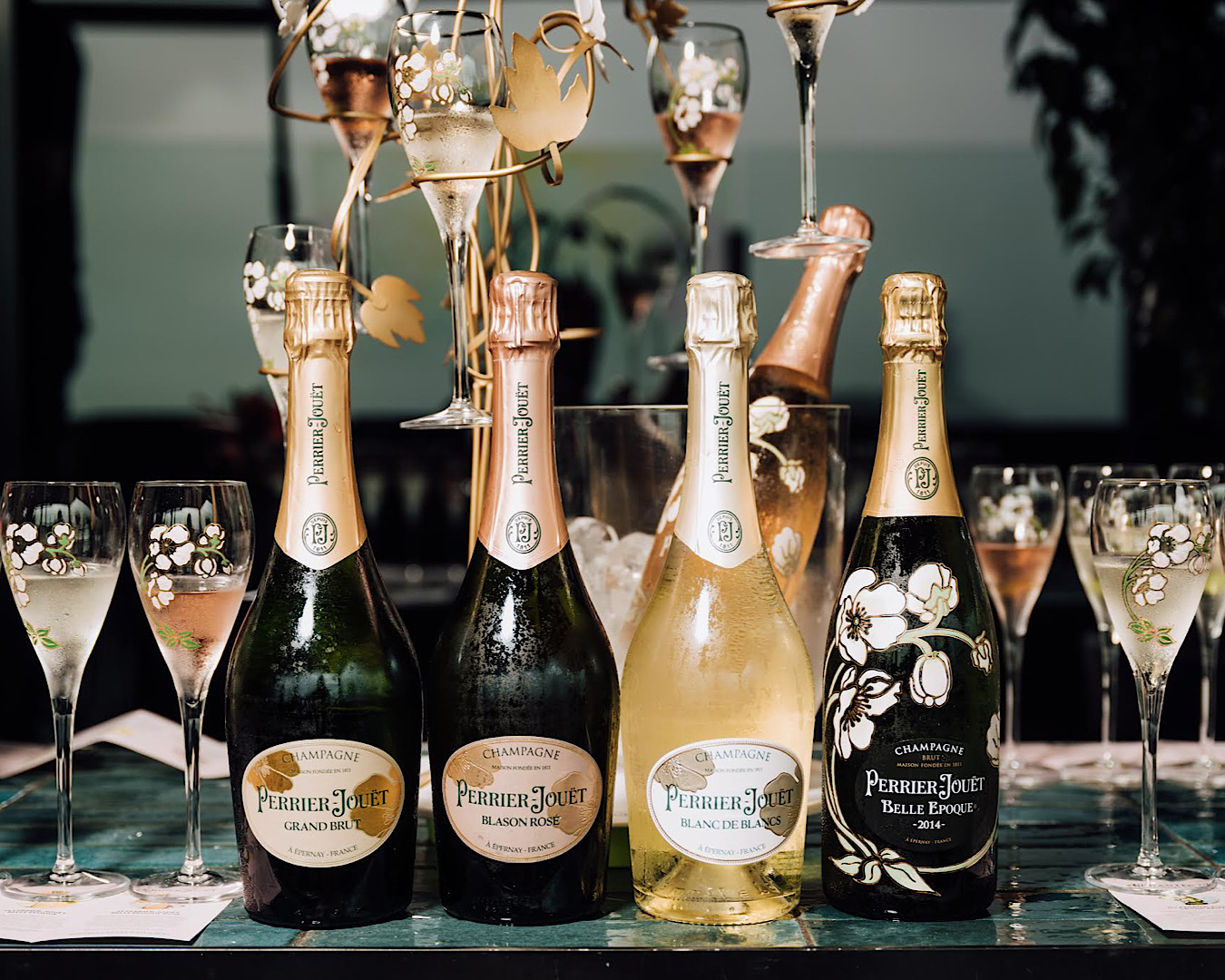Several bottles of Perrier Jouet in different varieties at Flora & Fizz, one of the best things to do in Wellington in 2024. 