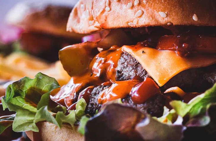 A juicy burger seen up close.