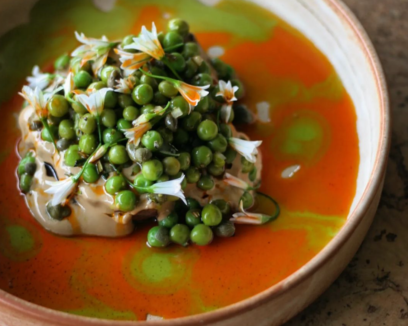 Kūmara with Marmite cream and capery peas from Forest, one of the best vegetarian restaurants in Auckland. 