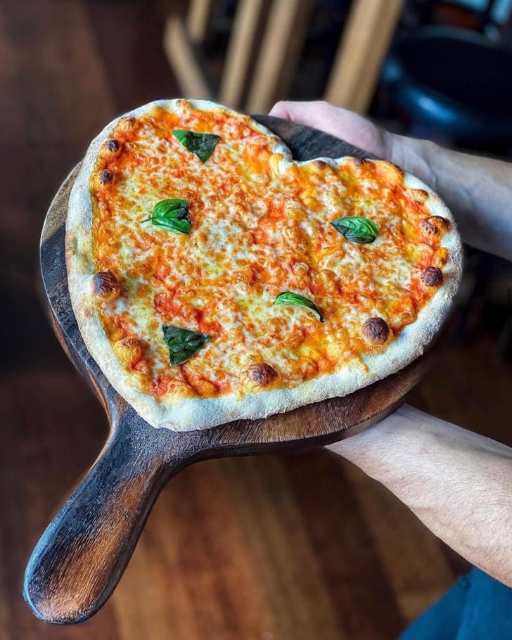 Heart-shaped pizza at Francesca's Italian Kitchen, one of the best Italian restaurants in Christchurch. 