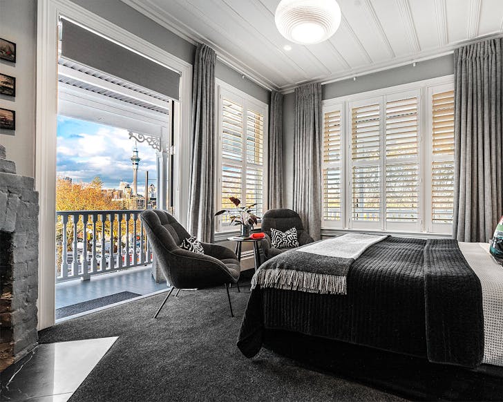 A room looks onto a view of the Sky Tower at Franklin38, one of the best hotels in Ponsonby.