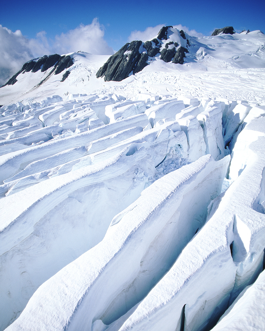 Deep snow and mountains at Franz Joseph Glacier