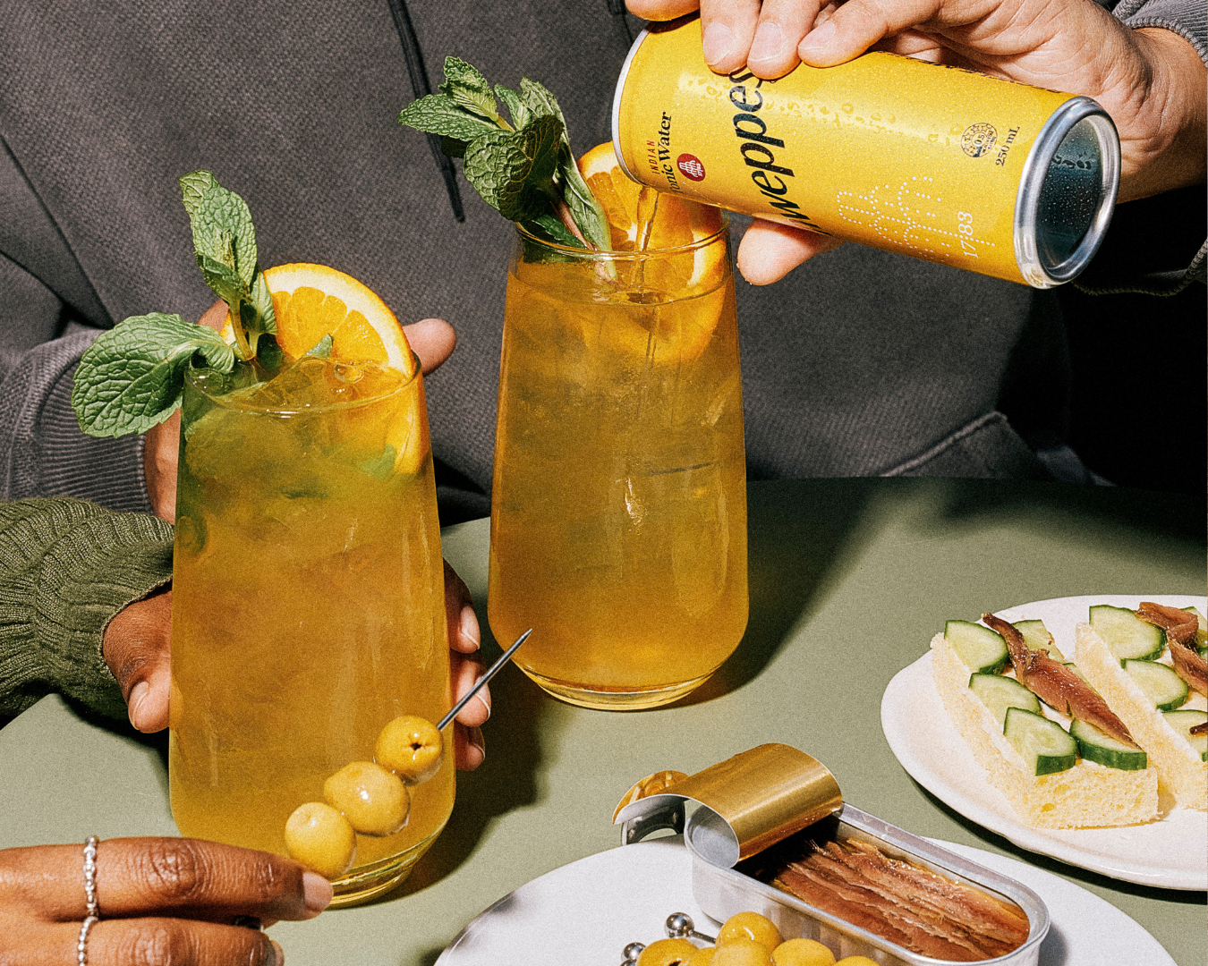 Hand pouring drink