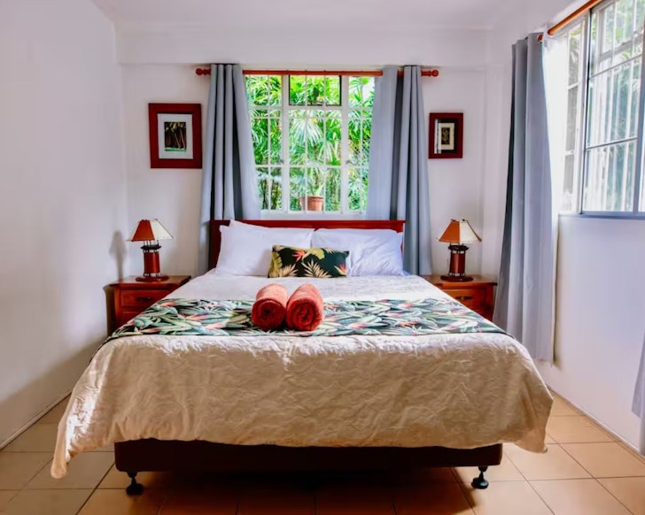 The pretty bedroom at Gardens Guest Home Airbnb Fiji