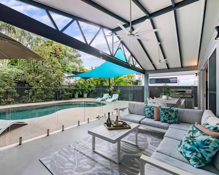 A view of the pool and outdoor dining zone at Gardens Villa one of the best Darwin Airbnbs
