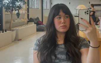 A Woman Showcasing Her Perfectly Blown Hair