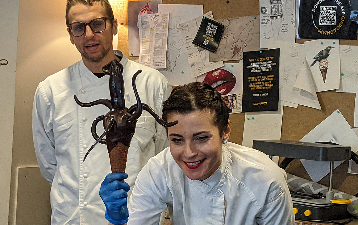 Giapo and Annarosa of Giapo hold out their famous colossal squid.