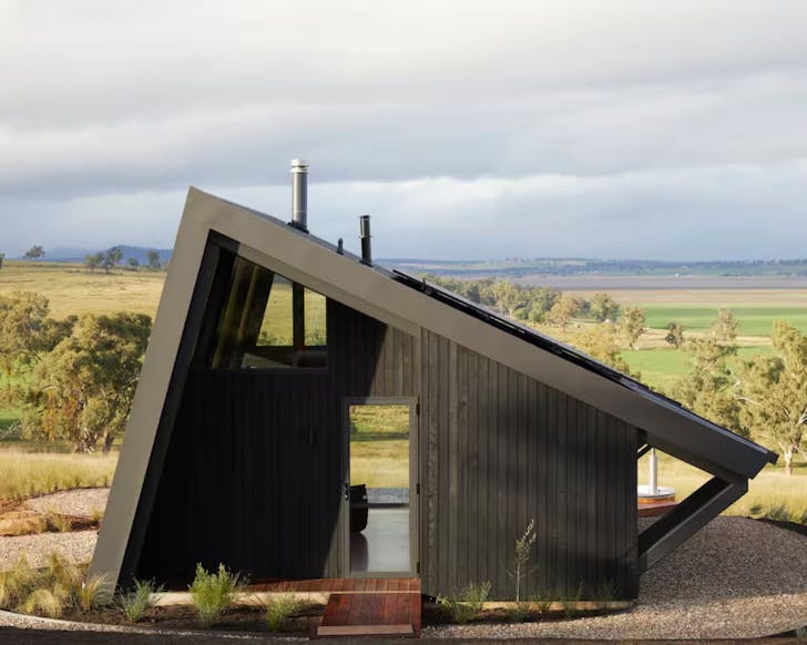 The black exterior of Gilay Estate Airbnb with hot tub in NSW