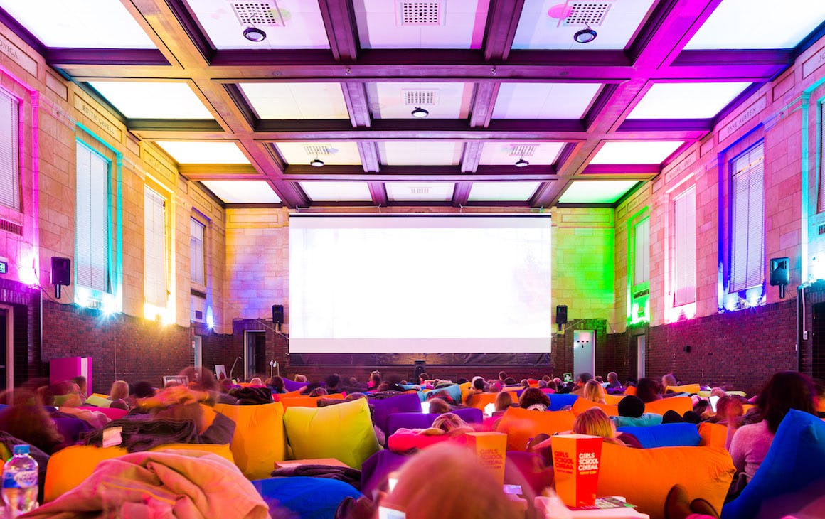 inside Girls School Cinema with bright bean bags