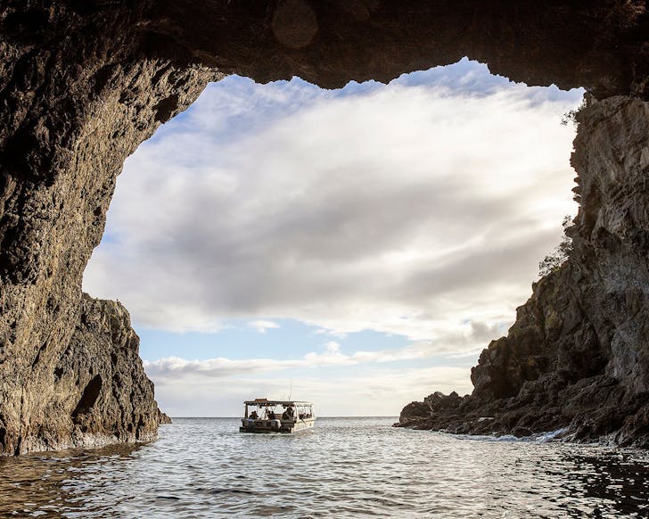 A glass bottom boat near goat island.