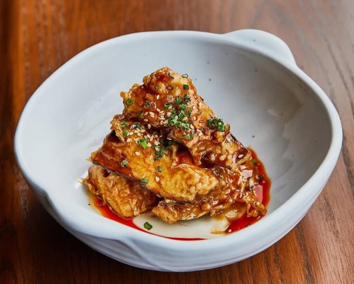 Crispy fried eggplant in a spicy glaze.