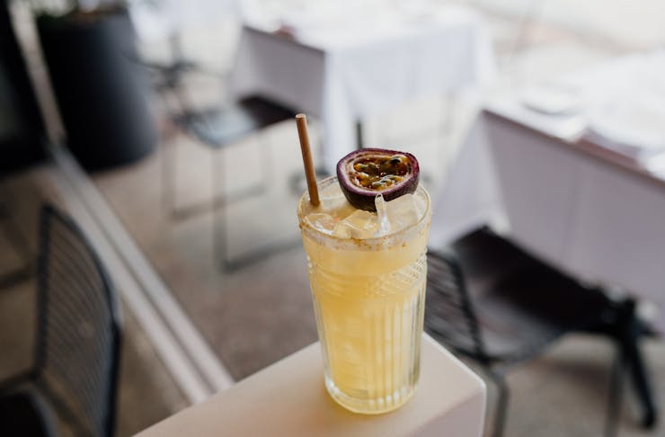 a yellow cocktail