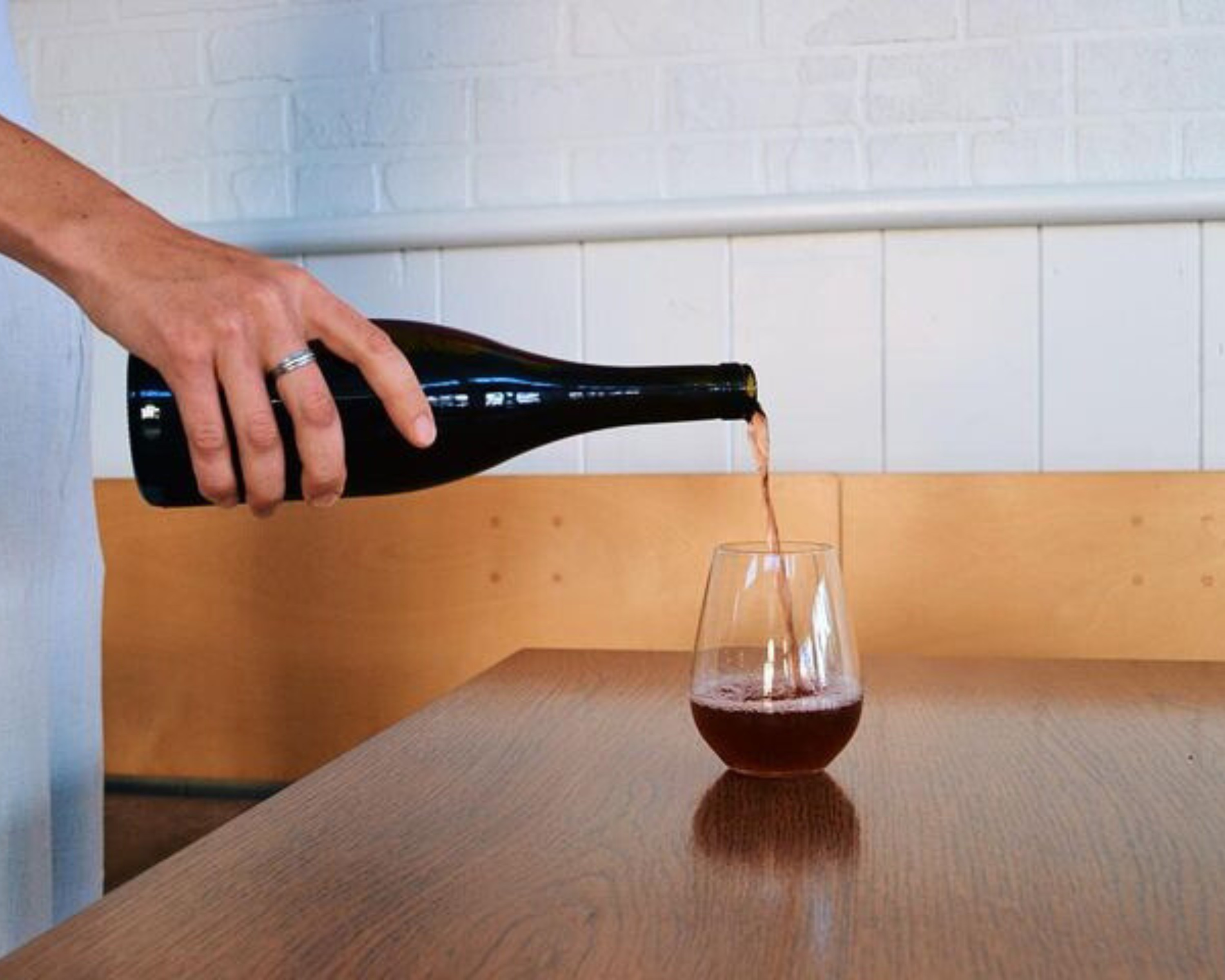 Wine pouring at new natural wine pop-up GoodFruit in Nelson