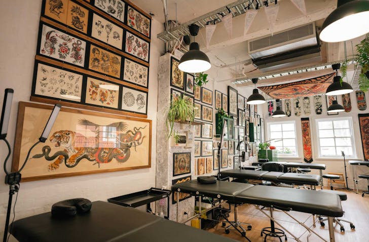 The upstairs studio at Good Marks Tattoo, with flashing hanging on the walls. One of Melbourne's top tattoo studios.