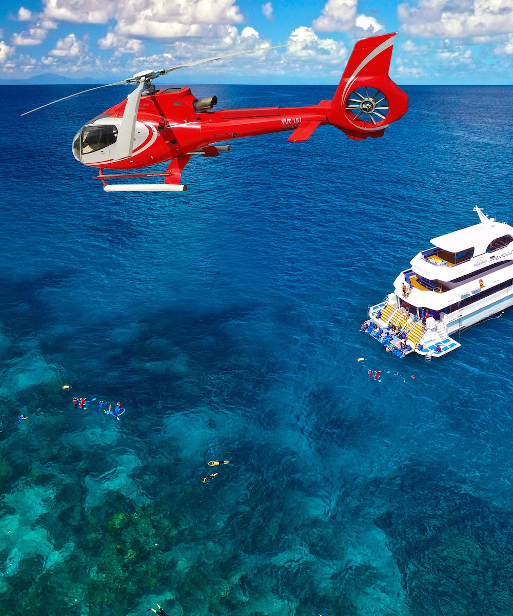 Helicopter flying above the Great Barrier Reef