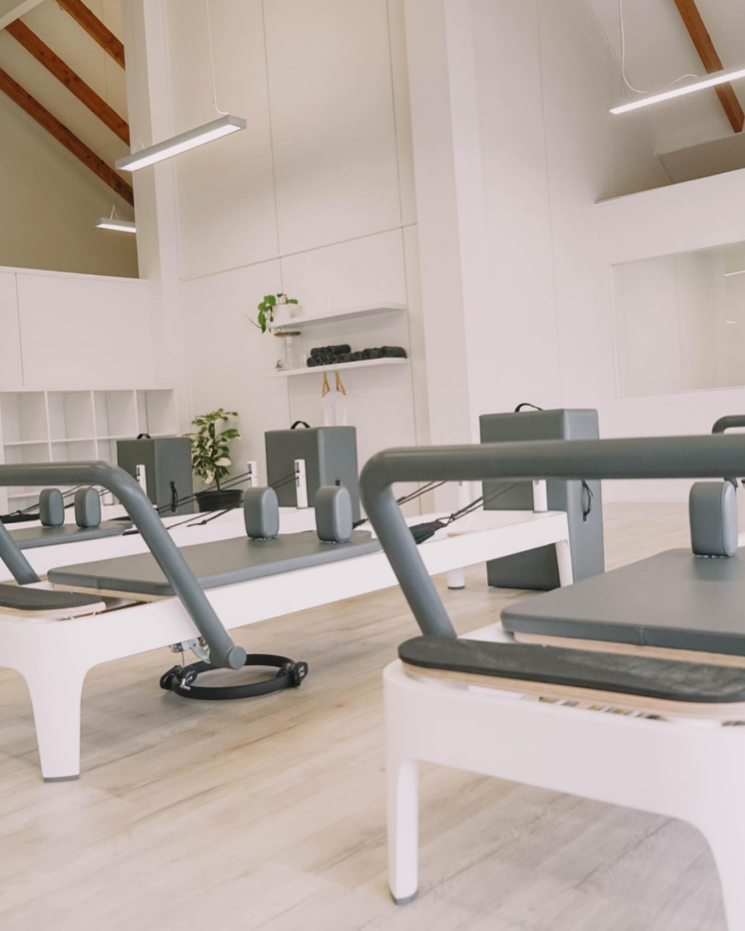 An empty gym with Pilates equipment 