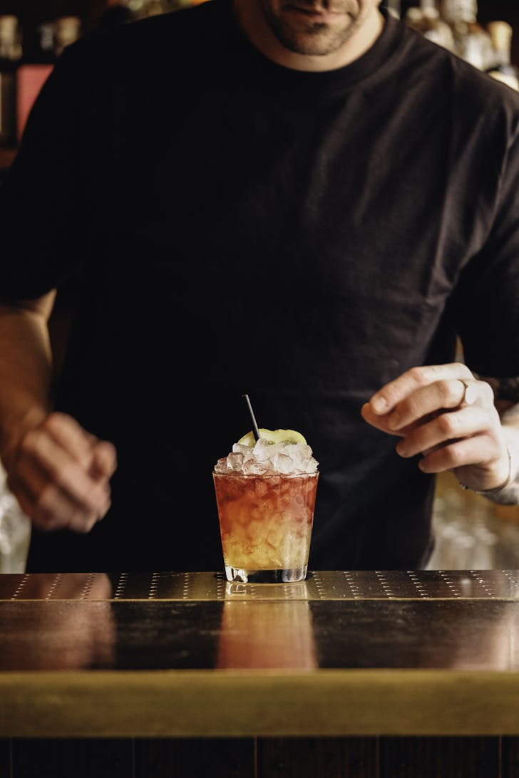 bartender prepping drink at hands down In fitzroy
