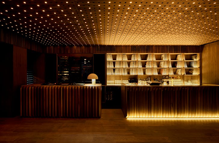Warm glowing lights illuminates this best bar Melbourne
