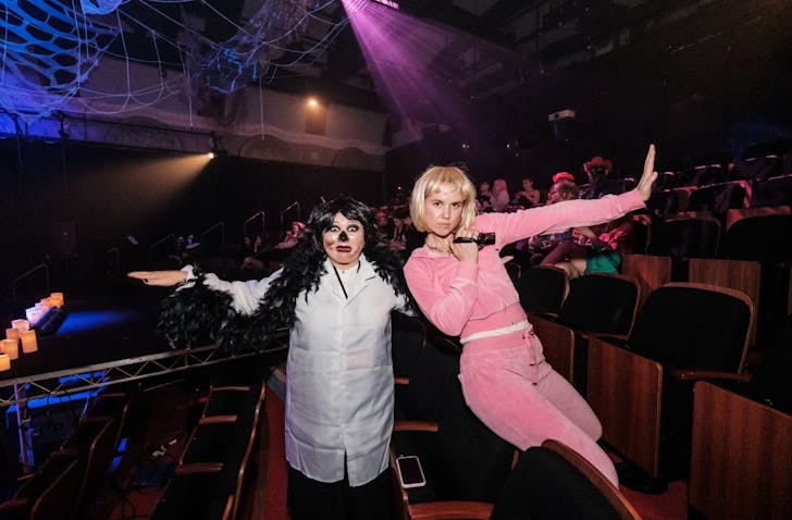 Two women dressed up in costume for Halloween
