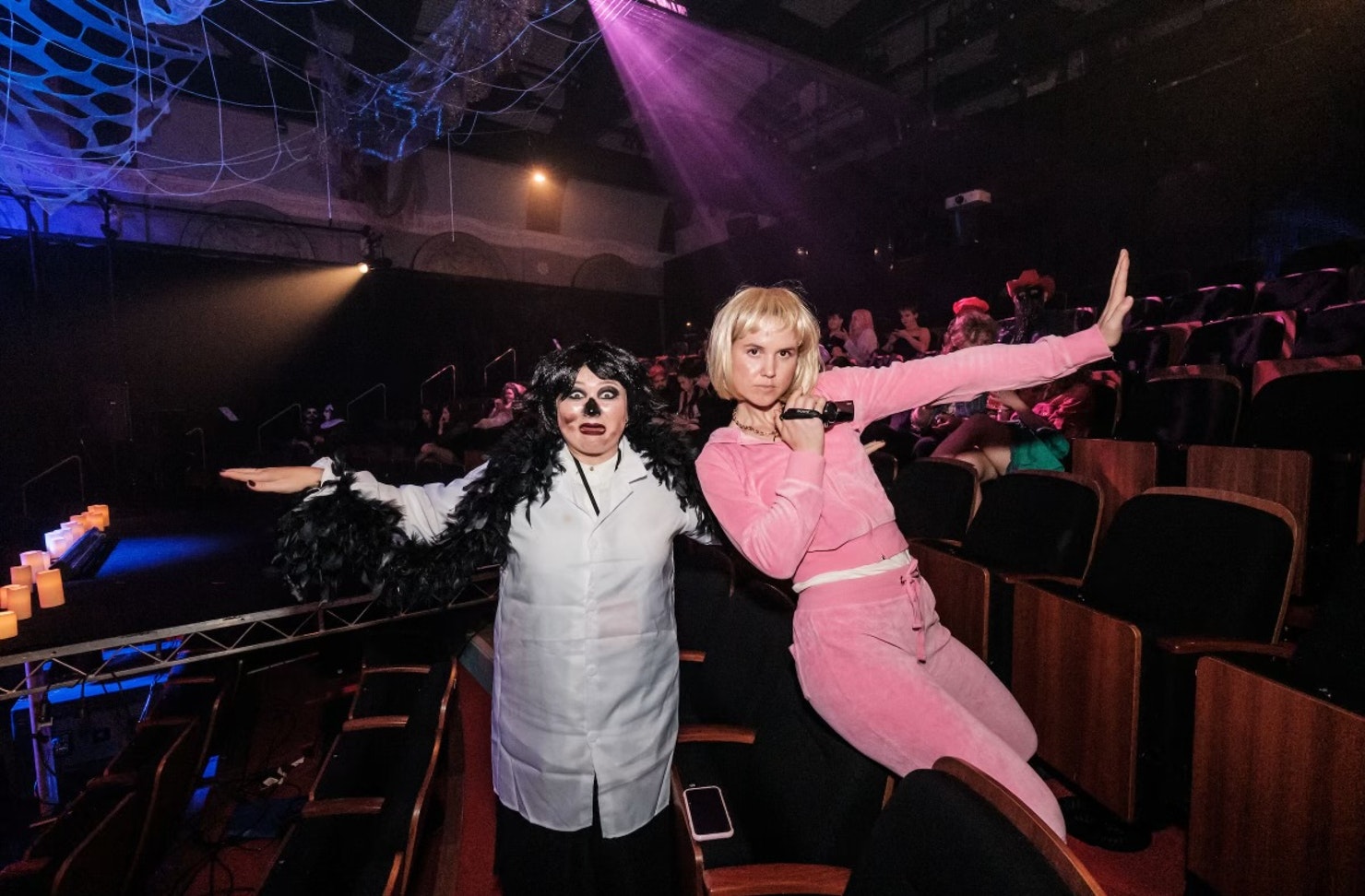 Two women dressed up in costume for Halloween