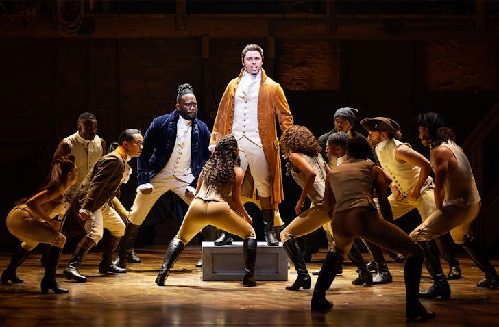 Hamilton cast performs on stage