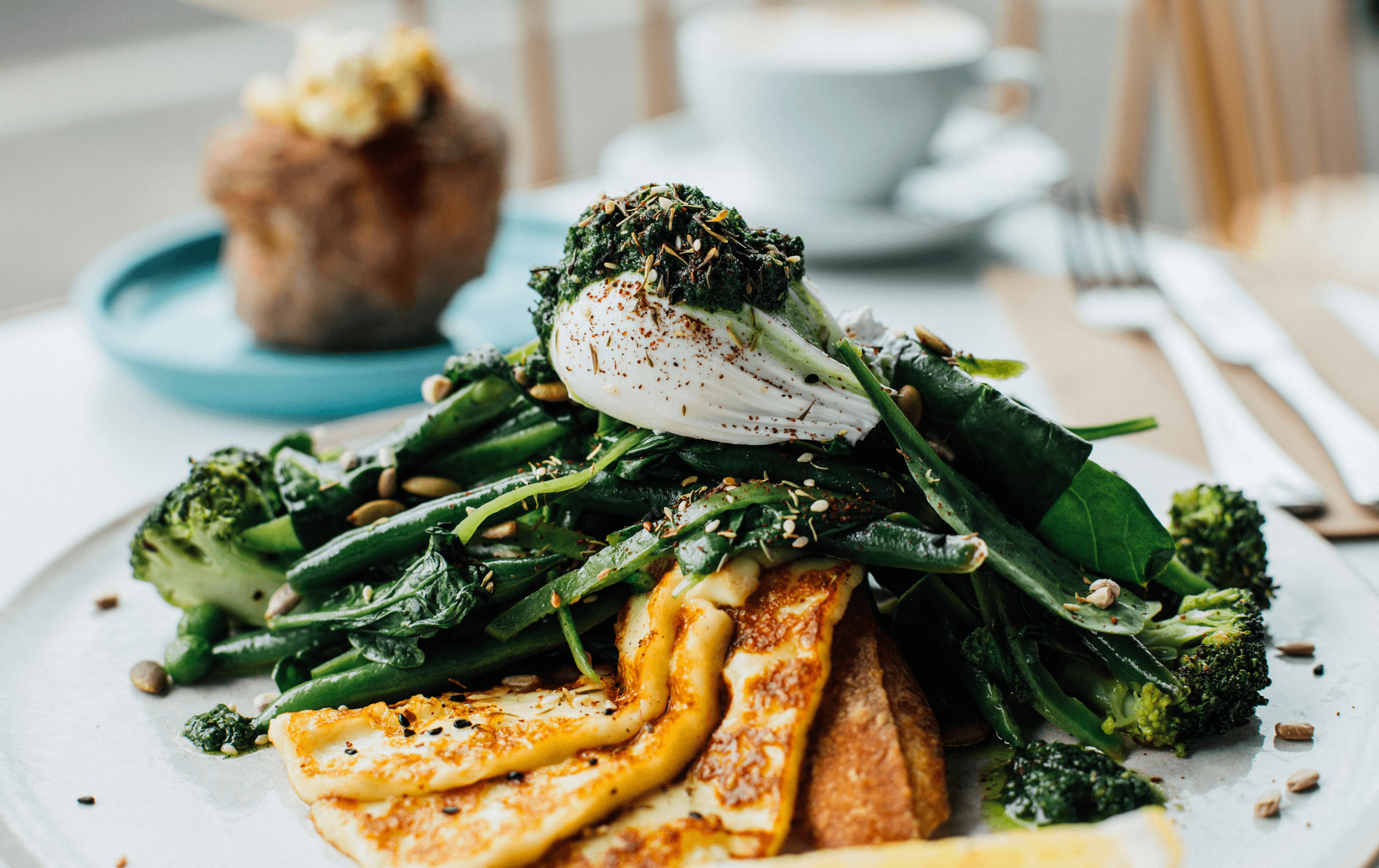 Hampton's poached egg over sauteed greens, one of the best breakfasts in Melbourne