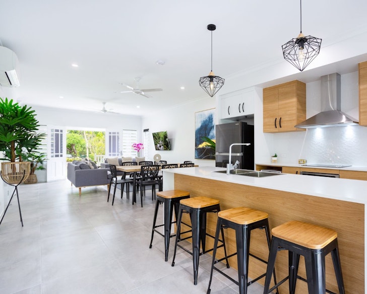 The designer kitchen at Hamptons Spa Villa best Cairns Airbnbs