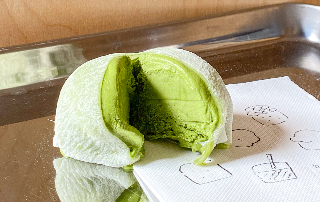 A small green mochi ice cream, some of the top ice cream melbourne has.
