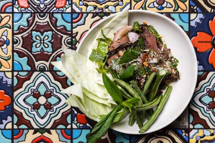Beef dish on table.