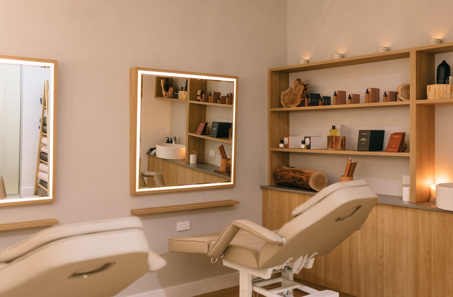 Heartwood's new facial massage space - two massage chairs with mirrors on the wall in front of them