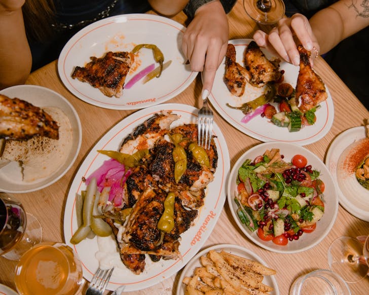 a plate of charcoal chicken at henrietta's bottomless lunch